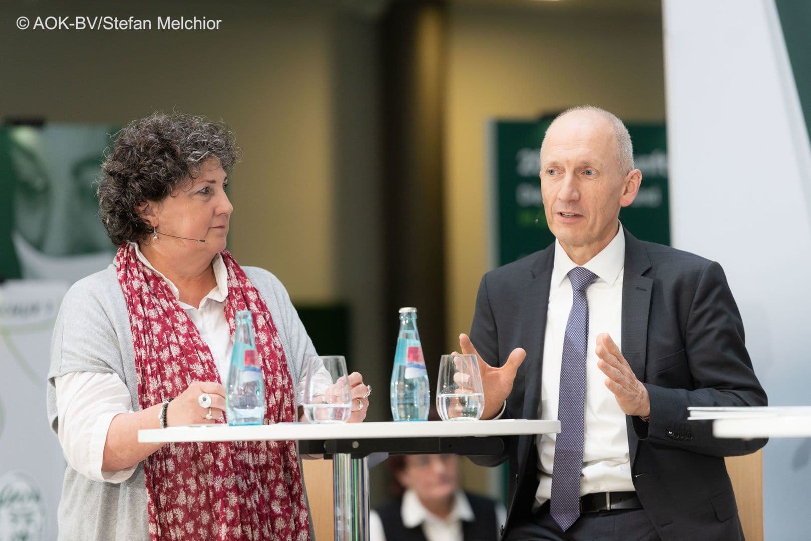 Anja Piel (DGB) mit Alexander Gunkel (BDI)
