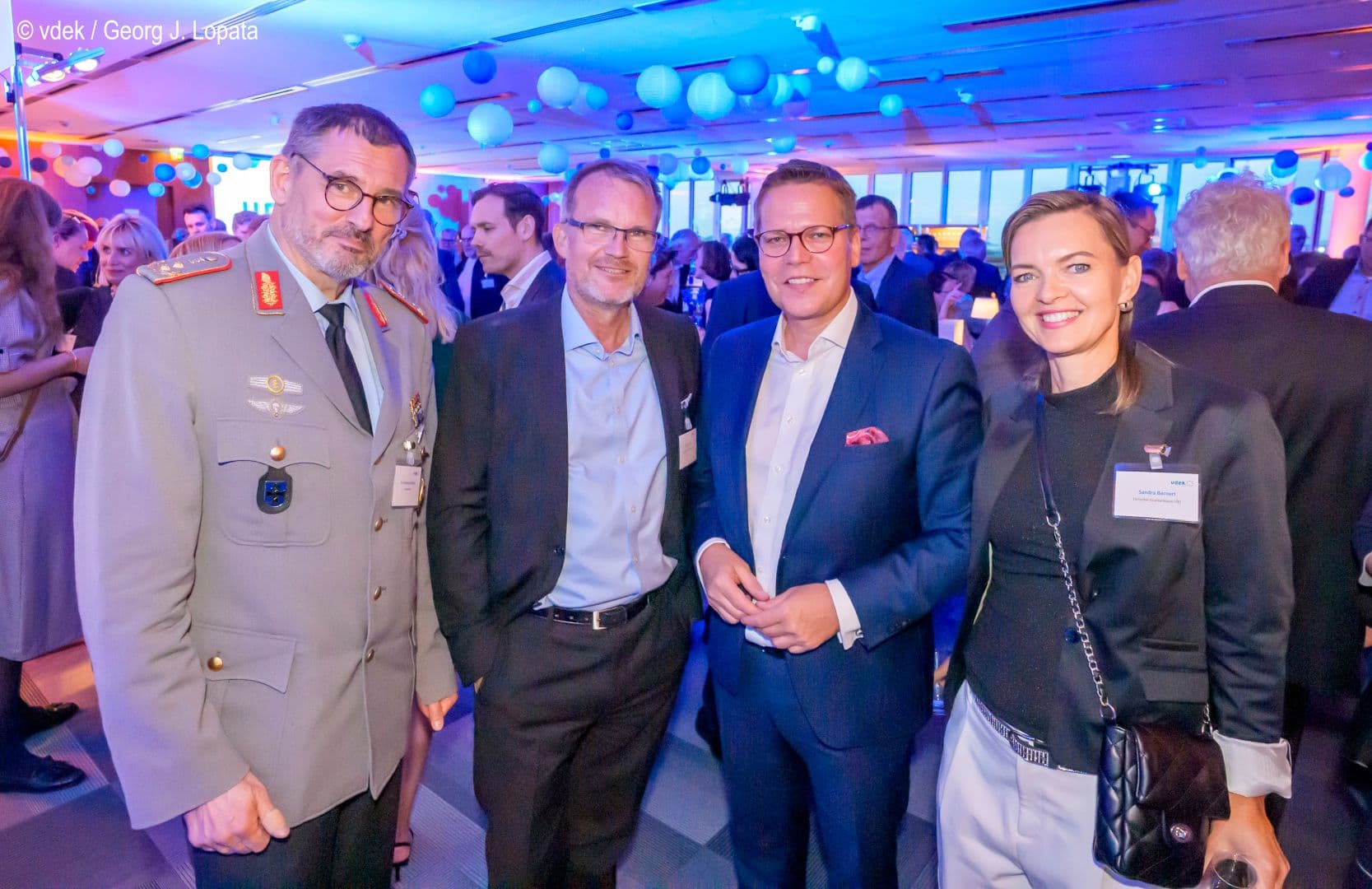 Johannes Backus (Bundeswehr), Jens Baas (TK), BMG-Staatssekretär Tino Sorge, Sandra Barnert (TK) (v.l.n.r.)