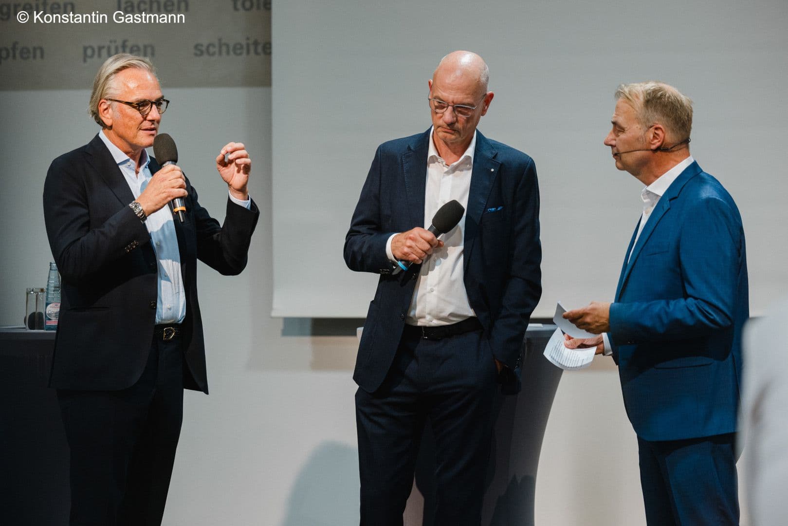 Walter Michael Leuthe (eurocom) und Alf Reuter (WvD) im Gespräch mit Moderator Henning Quanz (v.l.n.r.)